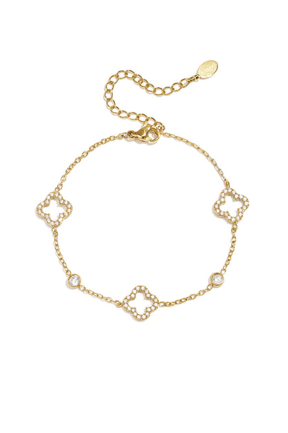 Bracelet with openwork and inlaid clovers and stones