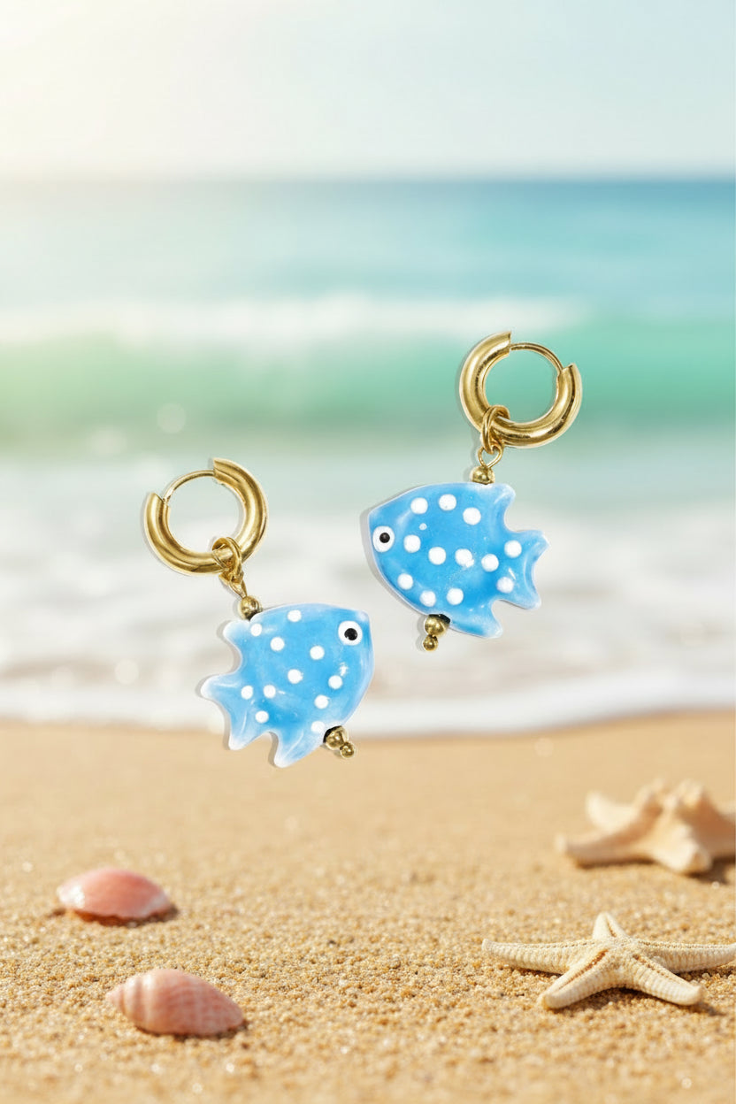 Earrings with fish charm