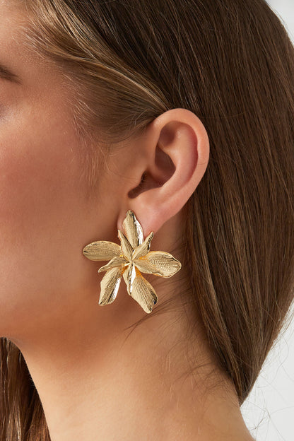Model Close Up Gold-tone sculptural orchid flower statement earrings