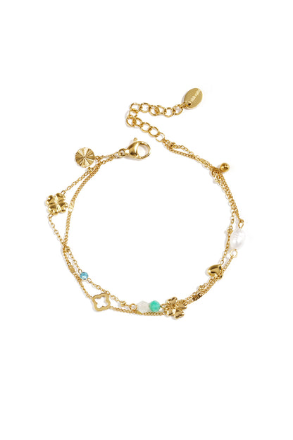 Bracelet with clover, beads and stones and fresh water pearls