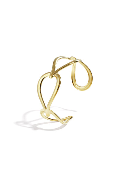 Goutte Open Bangle in gold, a band of linked open teardrops